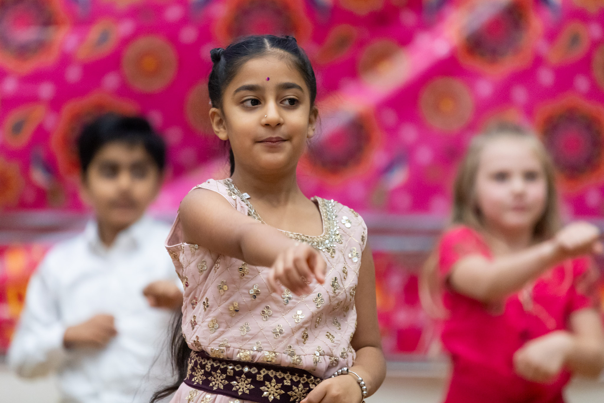 Harry Hooge Elementary students perform a dance at their 2024 Diwali assembly.